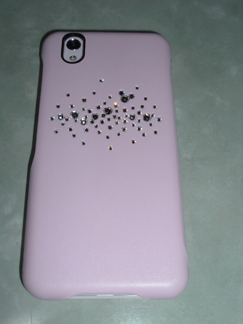 �X�}�z�J�o�[�̔w��